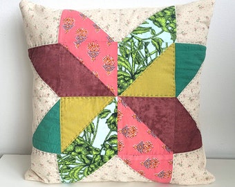 Quilted sawtooth star throw pillow