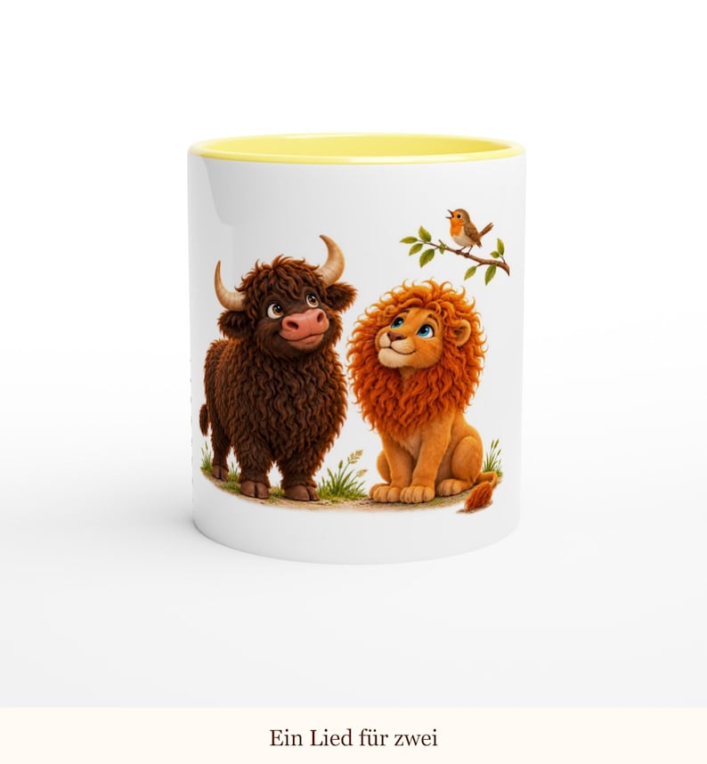 May include: A white ceramic mug with a yellow interior rim featuring a colorful illustration of a brown highland cow and an orange lion sitting together, with a small bird perched on a branch above them. The text Ein Lied f&uuml;r zwei is below.