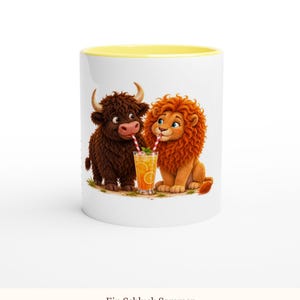 May include: A white ceramic mug with a yellow interior rim featuring a cartoon illustration of a brown Highland cow and an orange lion sitting together, both drinking from a single glass of orange juice with two red and white striped straws.