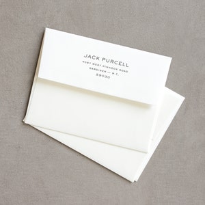 May include: White envelope with a black and white return address label that reads "JACK PURCELL, 4097 WEST PINHOOK ROAD, GARDINER - M.T., 59030"