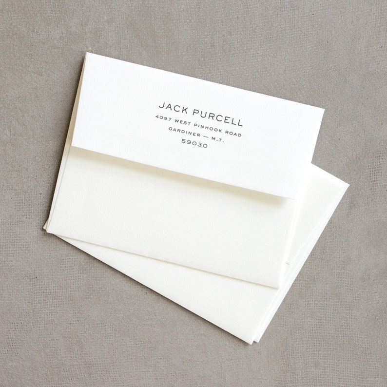 May include: White envelope with a black and white return address label that reads "JACK PURCELL, 4097 WEST PINHOOK ROAD, GARDINER - M.T., 59030"