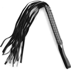 May include: A black leather whip featuring a long, wrapped handle with a secure wrist loop at the base. The top of the handle connects to a series of thin, flexible black leather strips that fan out, creating a long, flowing tail design.