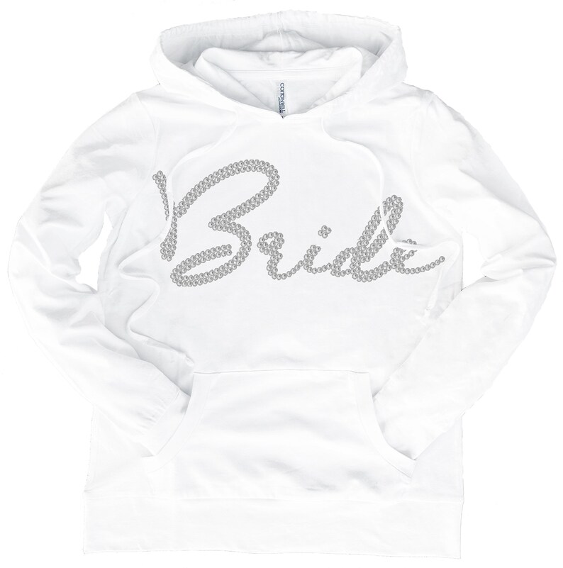 May include: White hoodie with a rhinestone design that says "Bride" on the front.