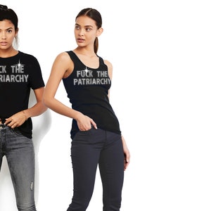 May include: A black short-sleeved t-shirt and a black sleeveless tank top, both featuring the white text "FUCK THE PATRIARCHY" printed across the chest with a small star graphic above the word "THE" on each garment.