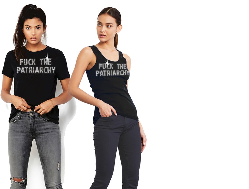 May include: A black short-sleeved t-shirt and a black sleeveless tank top, both featuring the white text "FUCK THE PATRIARCHY" printed across the chest with a small star graphic above the word "THE" on each garment.