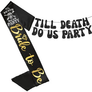 May include: A black satin sash featuring the gold text Bride to Be, a diamond icon, and a skull graphic with the text TIL DEATH DO US PARTY. Accompanying the sash is a black glittery banner with the text TILL DEATH DO US PARTY on two strings.
