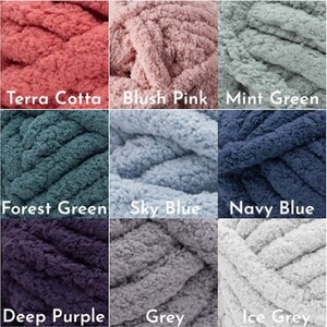 May include: Nine balls of yarn in various colors, including terra cotta, blush pink, mint green, forest green, sky blue, navy blue, deep purple, grey, and ice grey.