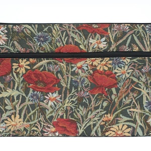 May include: A green zippered pouch with a floral tapestry design featuring red poppies and other wildflowers.
