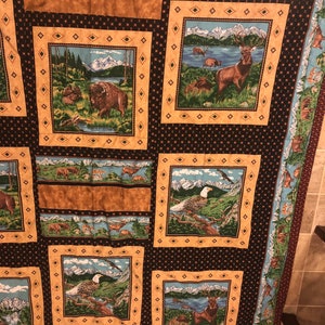 Hand quilted baby quilt, lap Quilt