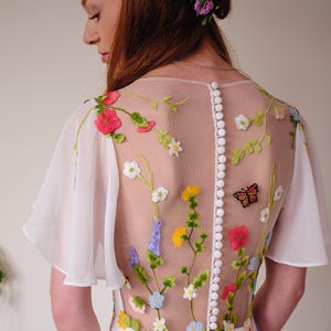 Floral embroidery wedding dress for a unique and unforgettable whimsical wildflower and garden flower wedding with customizable design