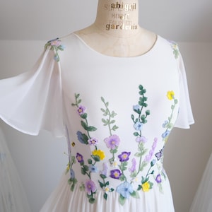 Floral wedding dress for a unique and unforgettable whimsical wildflower and garden flower wedding with customizable design