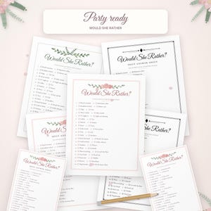 May include: A collection of printed game sheets titled Would She Rather with floral accents and checkboxes. The sheets include a list of questions for party guests, host answer sheets, and a wooden pencil resting on the paper surface.