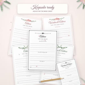 May include: A collection of white paper cards for wedding advice and wishes, featuring floral accents in pink and green. The cards include printed text such as Keepsake ready, Advice for the bride, and Wishes & Advice for the newlyweds, with lined sections for writing.