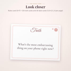 May include: A white rectangular game card with a light pink border featuring the word Truth in a script font and the text What's the most embarrassing thing on your phone right now? The top text reads You aisle love Look closer Rules card 5x7.