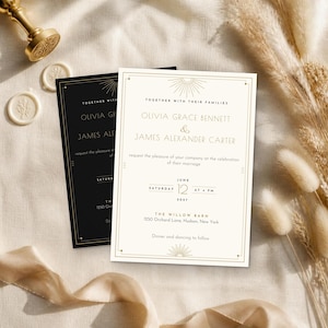 May include: Two rectangular wedding invitation cards, one black and one cream, featuring gold-toned geometric borders and sunburst motifs. The text includes the names Olivia Grace Bennett and James Alexander Carter, the date June 12, 2027, and the venue location.