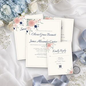 May include: A wedding invitation suite featuring cream-colored cardstock with navy blue text and floral illustrations in shades of dusty pink and dark blue. The set includes a main invitation, a save the date card, and a reply card with a QR code.