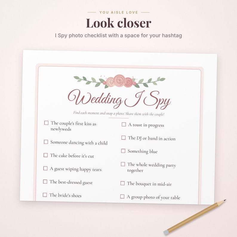 May include: A white Wedding I Spy game card featuring a floral illustration of pink roses and green leaves at the top. The text includes a checklist of photo prompts for guests, such as the couple's first kiss and a toast in progress, with checkboxes next to each item.