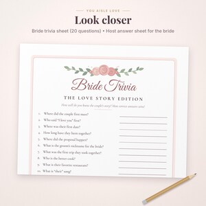 May include: A white Bride Trivia game sheet with a pink border and floral illustration at the top. The text reads Bride Trivia, The Love Story Edition, and lists ten questions about a couple with lines for answers and a pencil nearby.