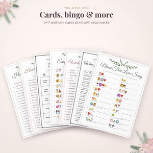 May include: A set of printable wedding game cards featuring titles like Name That Love Song, Who Said It, and Wedding Emoji Pictionary. The white cards include black text, emoji sequences, and numbered lists, with floral accents at the top corners.