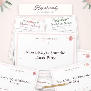 May include: A set of white bachelorette award cards with pink borders and floral accents. The cards feature text including Keepsake ready, Bachelorette Awards, and specific superlatives like Most Likely to Start the Dance Party.
