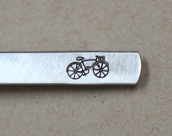 Bicycle handstamped tie bar in aluminum or nugold and available in 3 lengths