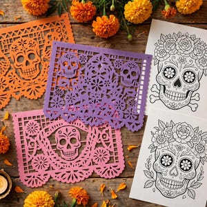 May include: Three rectangular sheets of orange, purple, and pink paper with intricate laser-cut skull and floral patterns, alongside two white sheets featuring black line art illustrations of skulls adorned with flowers.