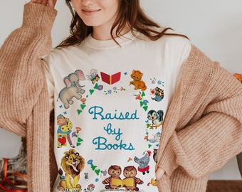 Heavyweight Tee | Raised by Books Golden Nostalgic Teacher Read Reading Love Little Retro Vintage Nostalgia Short-Sleeve Unisex T-Shirt