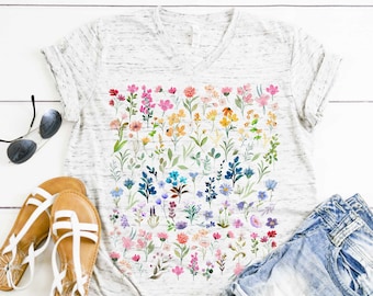 Earth Laughs in Flowers Cheerful Floral Soft Graphic Tees | UNISEX Relaxed V-neck & Tanks