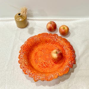 Handcrafted Stoneware Serving Bowl: Floral Orange Pottery Centerpiece