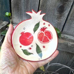 May include: A rustic wooden sign with the text "Welcome to our home" in white lettering. The sign features a distressed finish and a simple, inviting design, perfect for entryway decor.