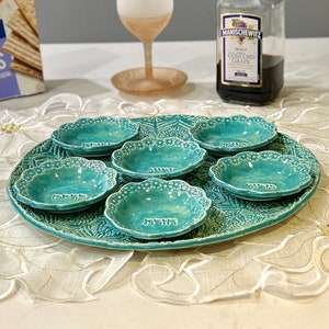 Seder plate, artisan ceramic Seder plate, six bowls in Hebrew, glazed in green, turquoise, detailed floral leaf texture, "Pesach" in Hebrew