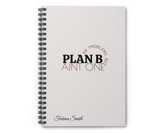 May include: A white spiral-bound notebook featuring the black text PLAN B and AINT ONE, with the phrase 99 PROBLEMS BUT curved in a light brown font. The name Fatima Smith is printed in a black cursive script at the bottom left corner.