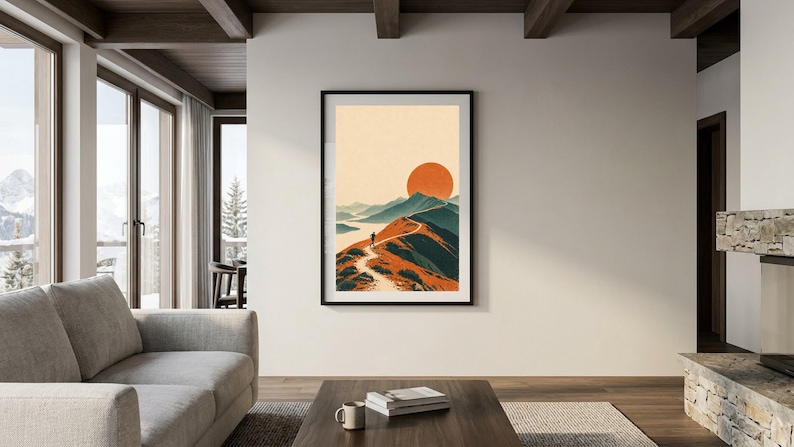 Peut inclure: Une impression d'art mural verticale encadr&eacute;e repr&eacute;sentant une illustration de paysage stylis&eacute;e avec un sentier de montagne sinueux, un randonneur solitaire, des cha&icirc;nes de montagnes bleu-vert et un grand soleil orange.