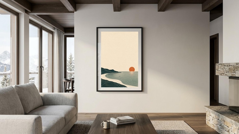 Puede incluir: Una l&aacute;mina de arte mural vertical enmarcada que muestra un paisaje costero minimalista con un cielo beige, una costa verde oscuro, una playa de arena clara y un sol naranja s&oacute;lido situado sobre el horizonte del mar azul.