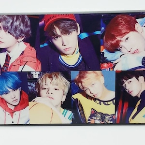 May include: A collage of seven photos featuring seven young men with different colored hair. The photos are arranged in a grid pattern. The men are wearing casual clothing and have various expressions on their faces.