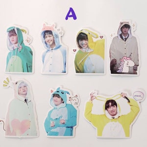 May include: Set of 8 colourful stickers featuring cartoon characters wearing animal costumes. The stickers feature different characters with various expressions and poses. The stickers are perfect for adding a touch of fun to your planner, laptop, or water bottle.