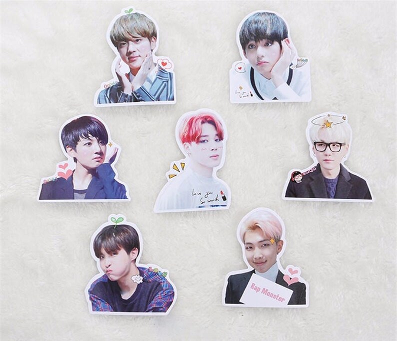 May include: Set of ten stickers featuring different members of a K-pop group. Each sticker has a white background with a colourful image of a person. The stickers feature the text "Rap Monster" and "Love you so much".