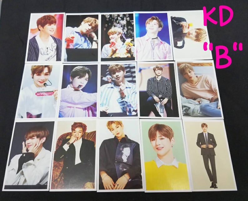 May include: A collection of 15 photo cards featuring a young man in various poses. The cards are white with a black border and feature the text "KD "B"" in the top right corner.