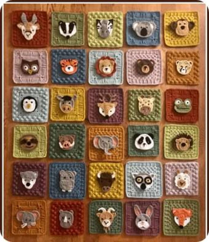 May include: A collection of thirty square crochet patches arranged in a grid, each featuring a unique three-dimensional animal face in the centre. The squares are crafted in various colours including red, green, yellow, blue, and pink.