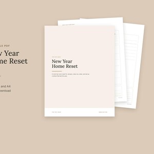 May include: A printable PDF New Year Home Reset Kit featuring nine pages in US Letter and A4 sizes. The document cover displays the text New Year Home Reset with a room-by-room guide for January, clear out, clean, and set up routines.