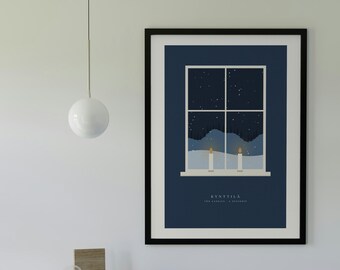 May include: A framed wall art print featuring a dark blue background with a white window frame illustration. Inside the window, two lit candles sit on a sill overlooking a snowy landscape at night. The text KYYNTILÄ TWO CANDLES A DECEMBER is printed below.