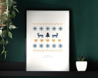 May include: A framed print featuring a pixel art pattern of blue snowflakes, dark blue reindeer, a dark blue pine tree, and yellow hearts. The text at the bottom reads TALVI, NORDIC GOLF, WINTER. The print is enclosed in a thin black frame.