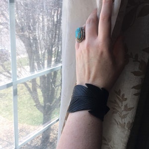 Black Raven leather cuff  with hand drawn pyrographic detailing. Unisex leather cuff. Leather cuff.