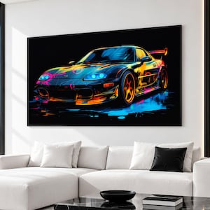 May include: A rectangular wall art print featuring a stylized sports car in black, orange, and blue neon colors. The car is depicted with glowing headlights and vibrant paint splatters against a dark background, mounted on a white wall.