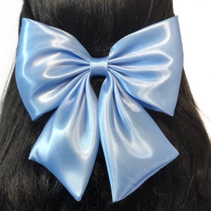 Light blue satin hair bow for women or girls. Large satin hair bow for wedding or prom. Handmade light blue satin fabric hair accessory. Bow image 3