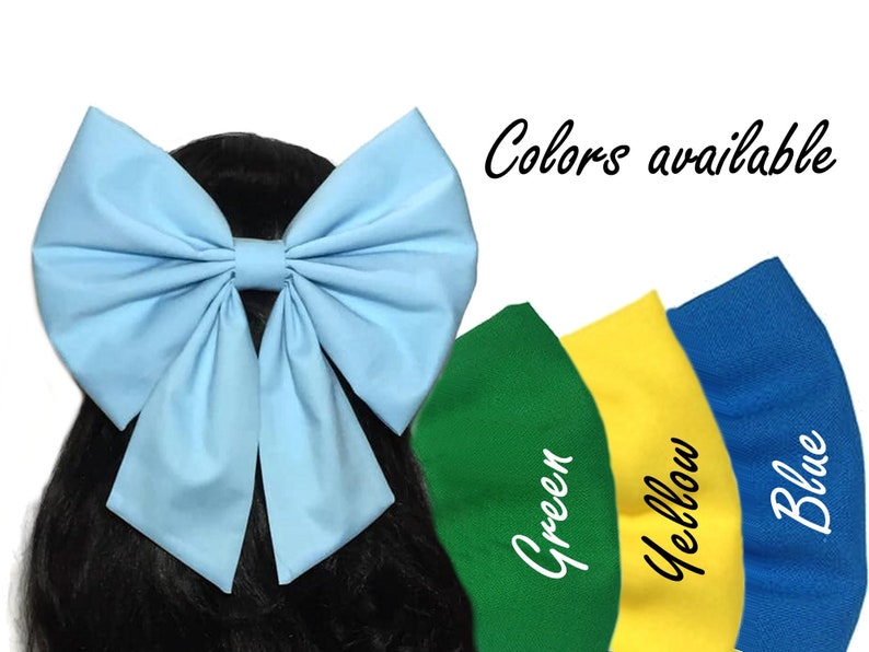May include: A large light blue fabric bow with a centre loop. Colours available: green, yellow, blue.