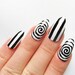 Christina reviewed Burton Stripe and Swirl Fake Nails / Halloween Nails / Stiletto Nails / Press on Nails / Goth Nails / Acrylic Nails 