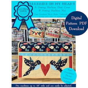 May include: A digital sewing pattern for a sewing machine dust cover and mat featuring a bluebird design. The pattern includes instructions for piecing and foundation paper piecing. The cover fits machines up to 18 inches wide.
