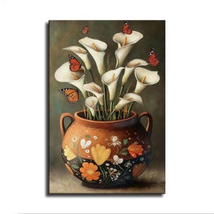 May include: A round, two-handled ceramic vase with a brown upper section and a black lower section, decorated with painted orange and yellow flowers. The vase holds a bouquet of white calla lilies with several orange monarch butterflies.