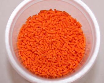 Vermicelles artisanaux couleur orange en pâte polymère vendus en sachet